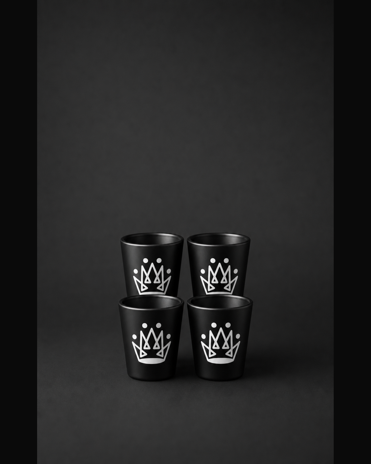 Originals CA matte black shot glass set with crown, studio product shot