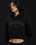 Model wearing Originals cropped pullover hoodie with wordmark and crown