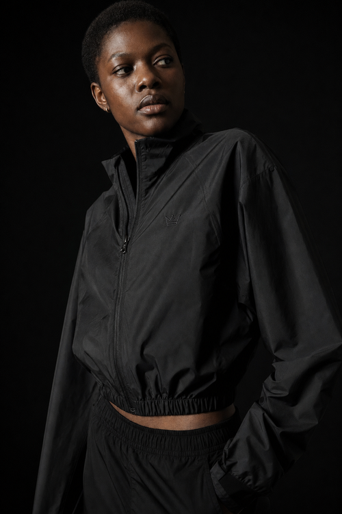 Model wearing Originals cropped technical windbreaker jacket