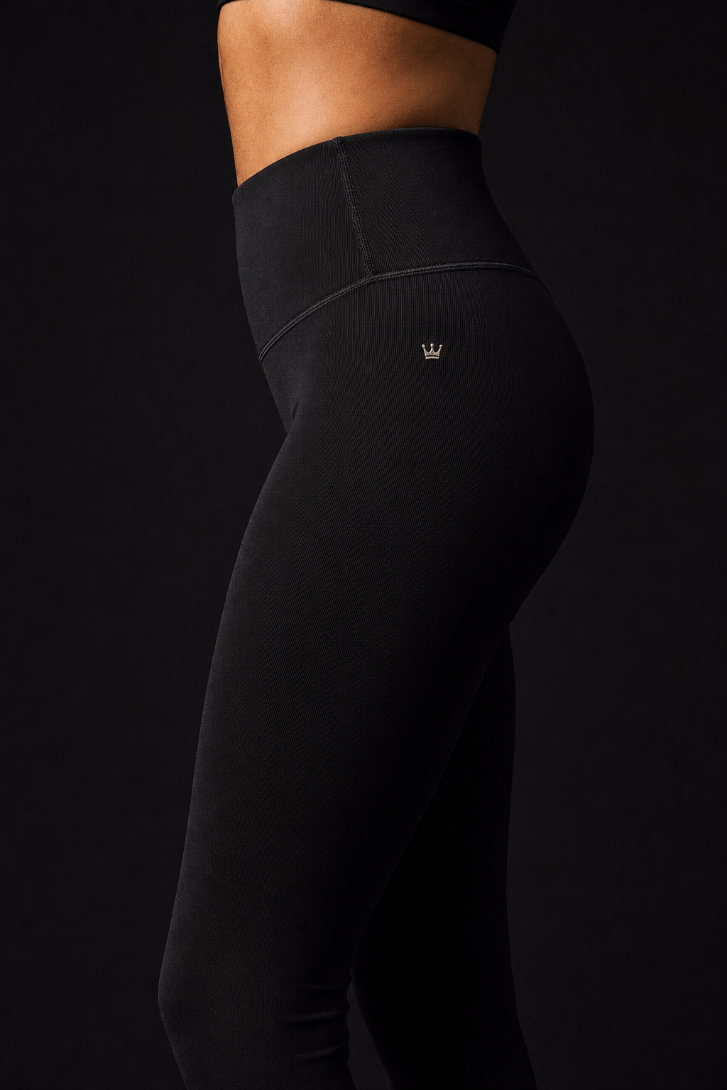 Model wearing Originals black high-rise compression leggings