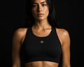 Model wearing Originals sculpt-fit sports bra with crown