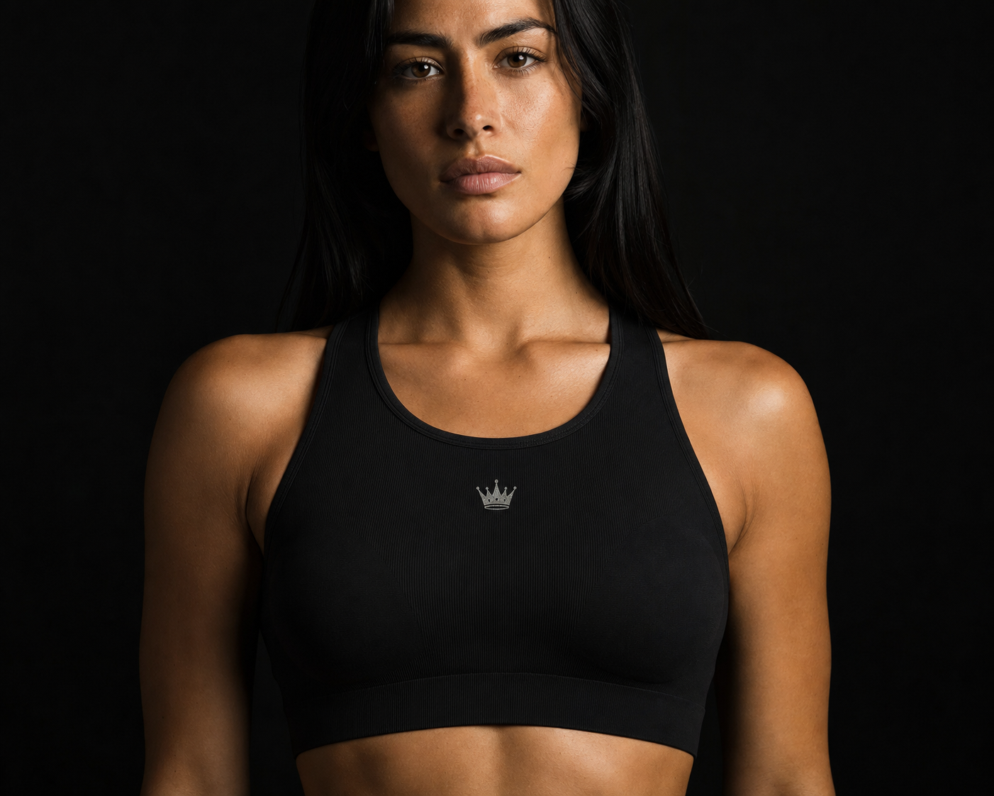Model wearing Originals sculpt-fit sports bra with crown