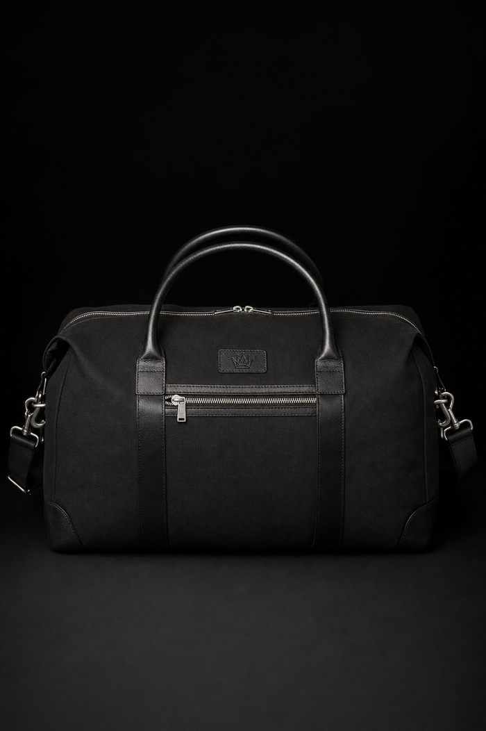Wells Duffel — Black canvas with crown emblem — front view